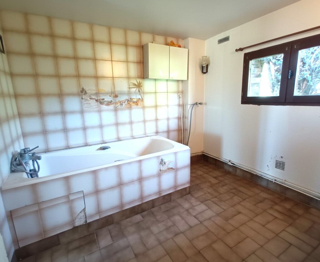 Maison de plain pied proche commerces et accès rapide RN12