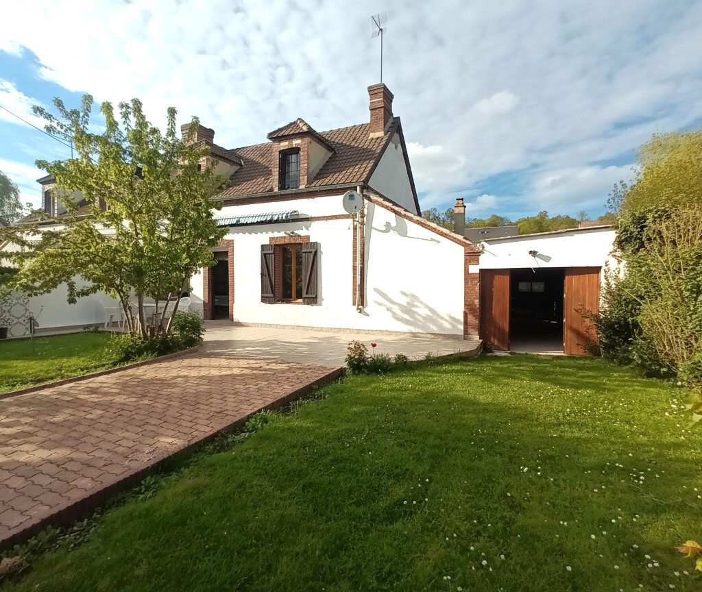 Maison de plain pied proche commerces et accès rapide RN12